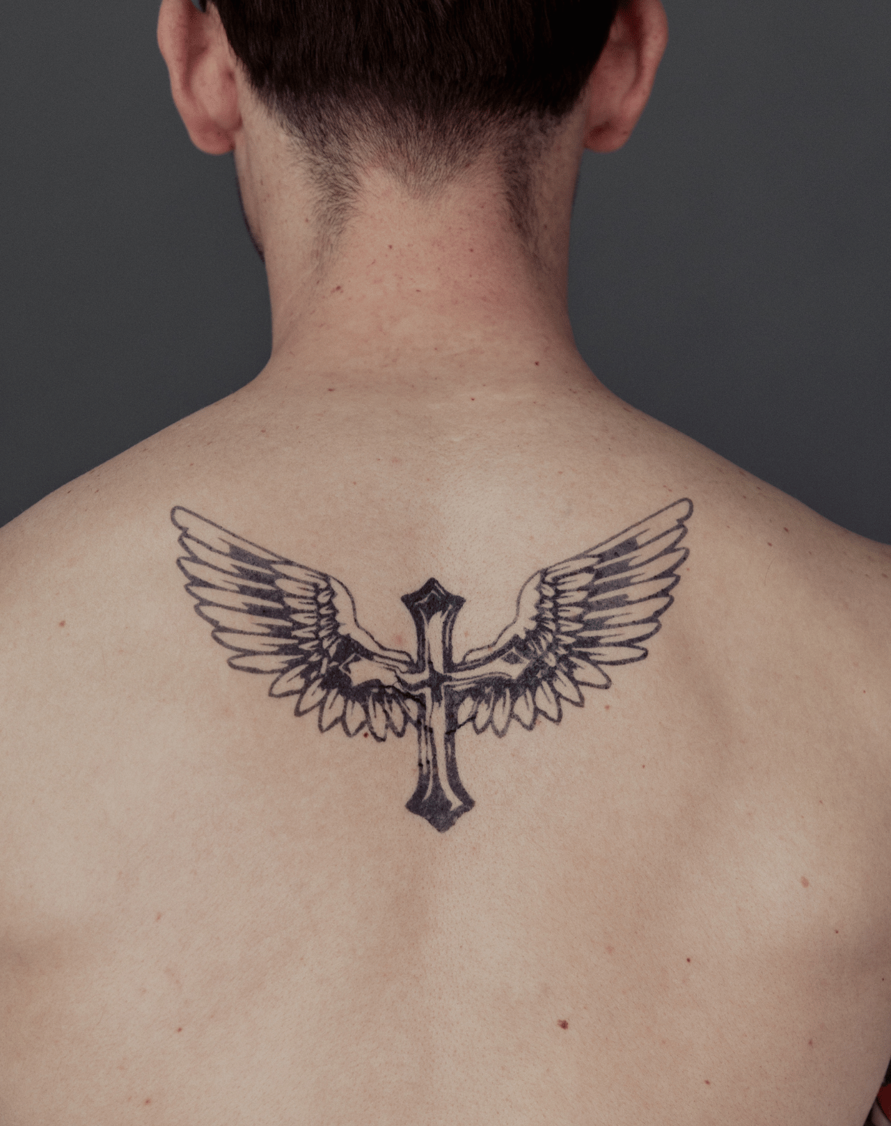 Back of Neck Cross Tattoos: Bold & Meaningful